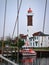 Port with lighthouse and defocused ropes in Timmendorf