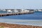 The Port MacDonnell jetty with commercial fishing boats in the background taken in South Australia on November 10th 2020