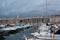 Port of Marseille at dusk, bathed in golden lights, France.