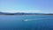 Port of olbia with panorama plate and motorboat