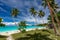 Port Orly sandy beach with palm trees, Espiritu Santo Island, Vanuatu