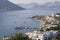 Port scenery in city Mirties on island Kalymnos, Greece with view on island Telendos.