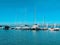 Port in Tallinn Estonian symbol flag and red  Lifebuoy on boat sea yachts on fishing   Baltic harbor sea water wave and sky ,prome