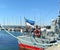 Port in Tallinn Estonian symbol flag and red  Lifebuoy on boat sea yachts on fishing   Baltic harbor sea water wave and sky ,prome