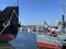 Port in Tallinn Estonian symbol flag and red  Lifebuoy on boat sea yachts on fishing   Baltic harbor sea water wave and sky ,prome