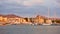 Port and waterfront in Aegina town at sunset