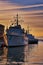 Port of Wismar with sunset and military boats on the Baltic Sea