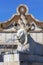 Porta del Popolo, gate of the Aurelian Walls and the stone lion from the Fountain of the Obelisk in Piazza del Popolo, Rome, Italy