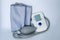 Portable electronic device for measuring blood pressure. Small display, semi-automatic cuff.
