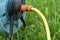 portable garden or watering hose. Water the lawn for grass or lawn growth. Water hose close-up