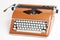 Portable Manual Typewriter In Red Orange