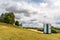 Portable plastic toilet on grass field