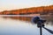 Portable recorder stands on a tripod on the lake shore