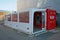 Portable red cargo container with two ATMs after earthquake in Christchurch, New Zealand