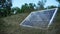 Portable Solar Panel Lie on the Ground in Nature Outdoors Close-Up