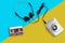 Portable tape player with radio and cassette tape and Headphone on a split yellow and blue background