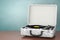 Portable Vintage Style Music Player Turntable in White Case. 3d Rendering