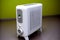 portable white heating radiator with temperature controller