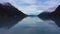 Portage Lake, Ice Blocks and Mountains on Sunny Day. Alaska, USA. Aerial View