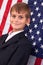 Portait of Caucasian boy with American flag