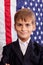 Portait of Caucasian boy with American flag