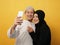 Portait of happy Asian muslim couple making selfie and smiling, husband and wife hugging full of love, family