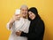 Portait of happy Asian muslim couple making selfie and smiling, husband and wife hugging full of love, family