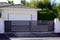 Portal door residential brown sliding home suburb metal aluminum house slide gate street wall