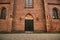 Portal with a Sculpture and doors in a Gothic church