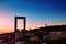 Portara ruins entrance of ancient temple of Apollo at sunset on Naxos island