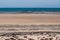 Portbail beach in the Cotentin in Normandy, with the island of Jersey on the horizon