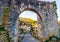 Porte de Rocamadour in the medieval village of Saint-Cirq-Lapopie in the Lot in Occitanie, France