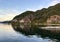 Porteau Cove Provincial Park has waterfront campsites overlooking Howe Sound and mountains beyond. The old vessel was