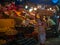 A porter carrying empty cart in fruit market in South Mumbai