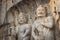 Porter\'s statue rock carving at Longmen Grottoes, Luoyang , Hena