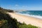 Porthminster beach St Ives Cornwall England with white waves and blue sea and sky