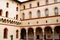 Portico with arched vaults in the courtyard of Castello Sforzesco. Milan, Italy