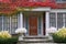 portico entrance and colorful ivy in fall