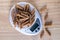 A portion 50 gm of pasta Penne on a kitchen scales, flat lay