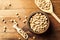 Portion of Chick Peas in wooden bowl with spoon