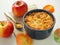 Portion of coffeecake in blue bowl. Biscuit with autumn apples. Homemade crumble pie with streusel topping.