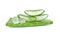 Portion cut fresh aloe vera leaf on white