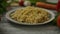 Portion of noodles on plate amidst assorted vegetables