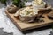 A portion of Olivier salad with chopped pickles, vegetables, served on a white plate on a cutting board