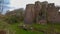 Portion of the ruins of Goodrich Castle in Herefordshire, England with mossy ground