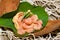 Portion of shrimps on a nasturtium leaf