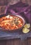 Portion of Spanish fish and chorizo soup