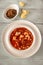 Portion of Spanish fish and chorizo soup