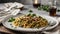 portion of tagliatelle rye and courgette with meat sauce in a white plate on wooden table