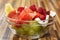 Portion of tasty heathy meal served in bowl on kitchen desk